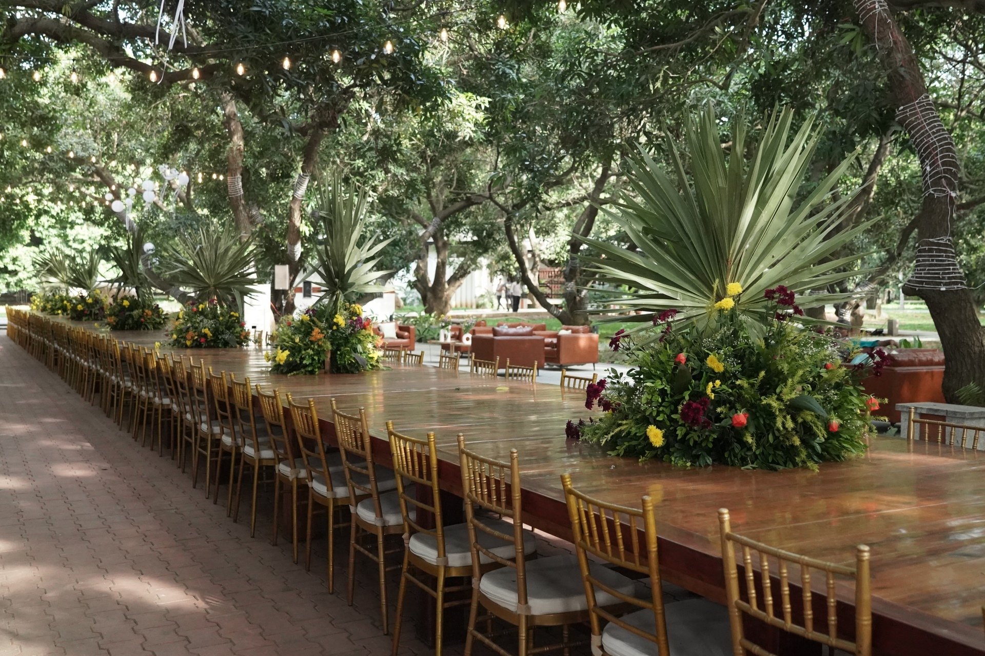 The 156-foot table stretching beneath a canopy of trees