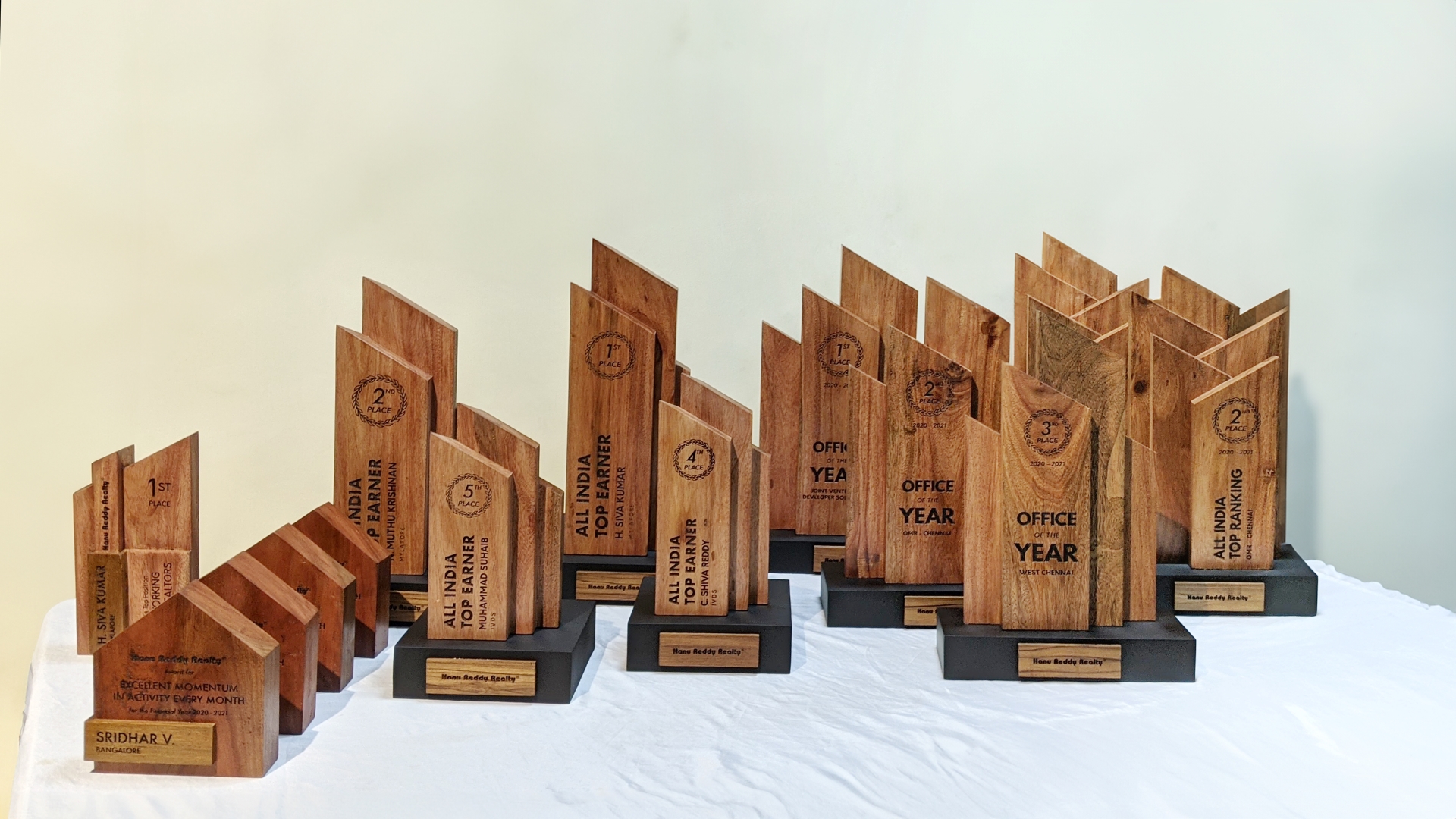 A row of wooden award trophies